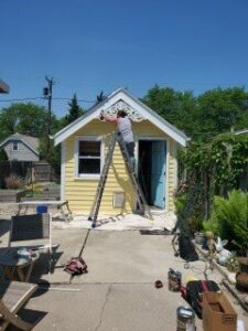 Exterior of the massage studio power washed and painted.