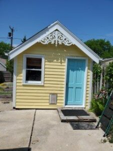 Massage studio exterior power washed and freshly painted.