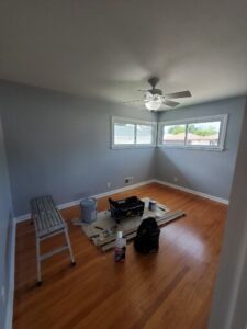 Trim changed from stained to enamel, walls finished with 2 coats of Super Paint.
