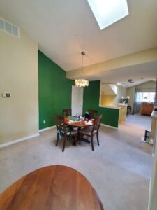Repainted interior with striking accent walls.