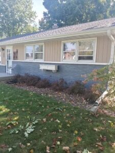 Exterior brick power washed and sealed with two coats of Loxon XP.