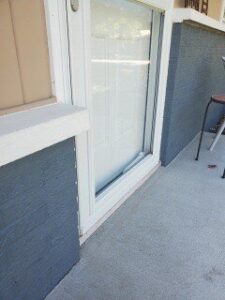 Power washed and coated with 2 layers of Loxon XP on exterior brick.