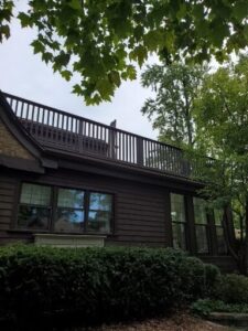 Power washed deck, then stained with 2 coats of semi-solid in 2 colors.