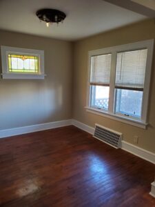 Trim transformed from stained to enamel, walls repaired and coated with 2 layers of Super Paint.