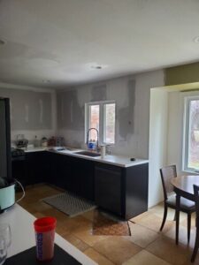 Remodeling done with mud finish, primer, texture, and paint.