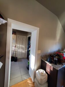 Caulked trim with 2 coats of Tough Scuff enamel, ceiling and walls covered with 2 coats of Super Paint.
