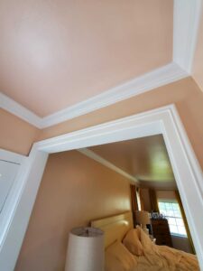 Trim caulked and coated with 2 enamel layers, walls with 2 coats of Super Paint.