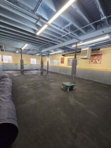 Transformed Mac's Pet Depot BARk Park with expert dryfall painting services.