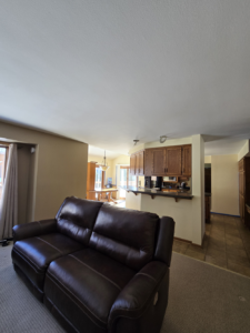 Repaired ceiling drywall, applied a sand texture for a seamless look, and finished with two coats of high-quality Super Paint.