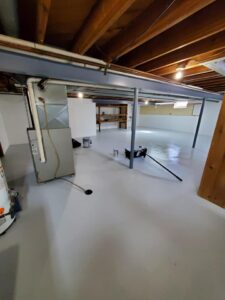 Walls waterproofed with Drylok, floor sealed with Armorseal, and beams painted with enamel – 2 coats each.