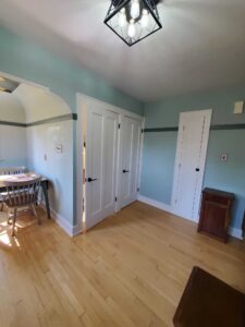 Trim and doors caulked, then coated with 3 layers of enamel. Ceilings and walls painted with 2 coats of Super Paint.