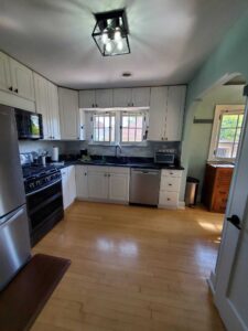 Trim and doors sealed with caulk and 3 enamel coats. Ceilings and walls painted with 2 coats of Super Paint.