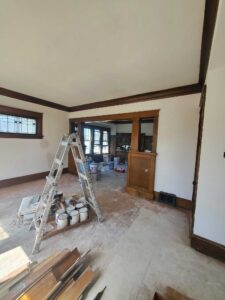 Plaster walls repaired, skim coated, and primed with 2 coats.