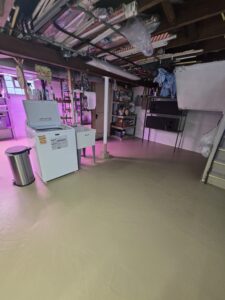 Loxon XP masonry coating paired with Armorseal concrete floor system. Freshly coated basement masonry walls with Loxon XP and Armorseal painted concrete floor